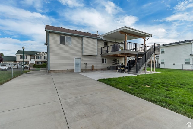 1874 W 180 S, Orem, UT 84059 - rear view of house featuring stairway, a deck, a patio area, and central AC