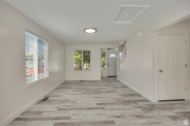 2240 S Lorin Cir W, Ogden, UT 84401 - entrance foyer with plenty of natural light, light wood-style flooring, and baseboards