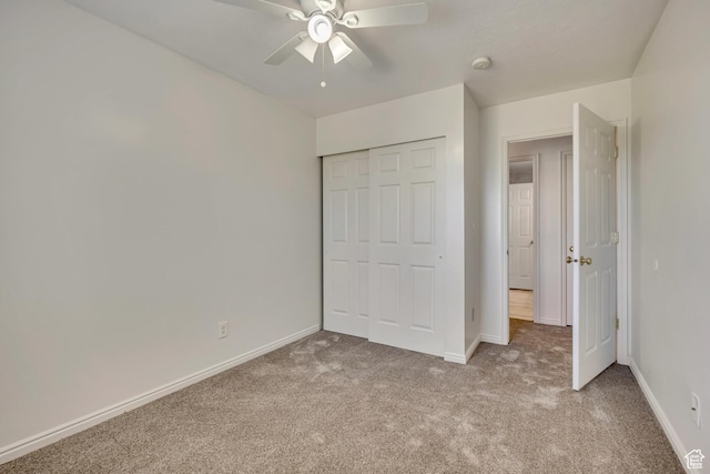 2240 S Lorin Cir W, Ogden, UT 84401 - unfurnished bedroom with carpet flooring, a closet, baseboards, and ceiling fan