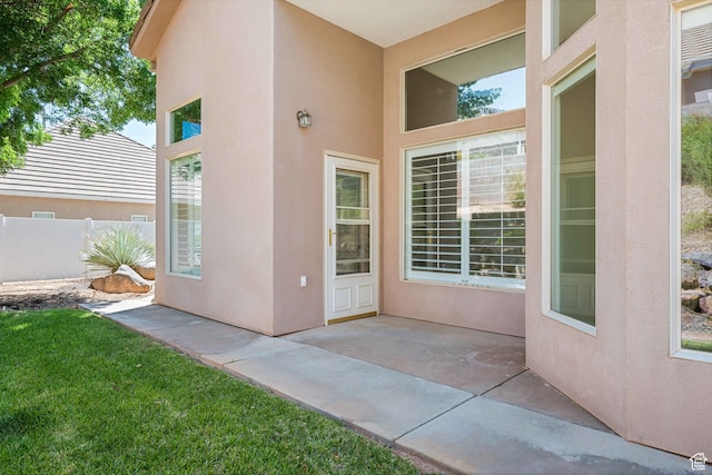 42 N 1100 W, St George, UT 84770 - entrance to property featuring stucco siding and a patio area