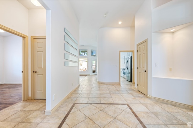 42 N 1100 W, St George, UT 84770 - hallway featuring inlaid floor details, a high ceiling, baseboards, and recessed lighting