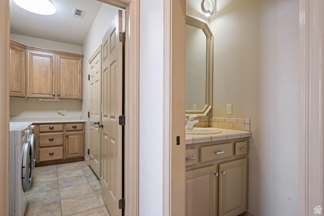 42 N 1100 W, St George, UT 84770 - washroom featuring cabinet space and separate washer and dryer