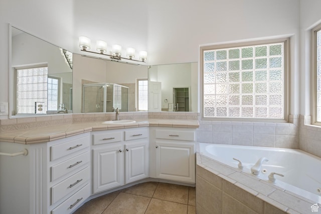 42 N 1100 W, St George, UT 84770 - full bathroom featuring a stall shower, vanity, a jetted tub, and plenty of natural light
