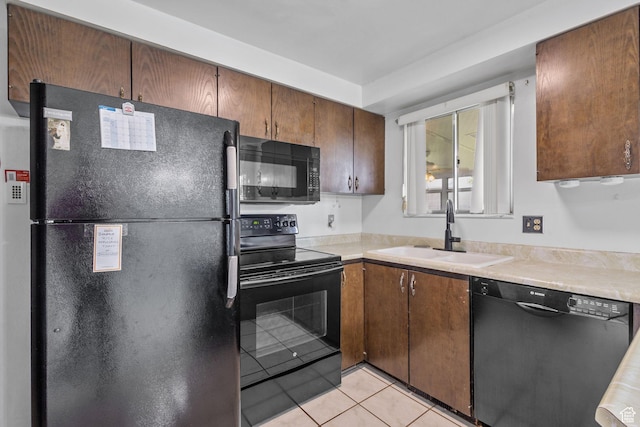 9216 S 2700 W, West Jordan, UT 84088 - kitchen with black appliances, a sink, light tile patterned floors, and light countertops