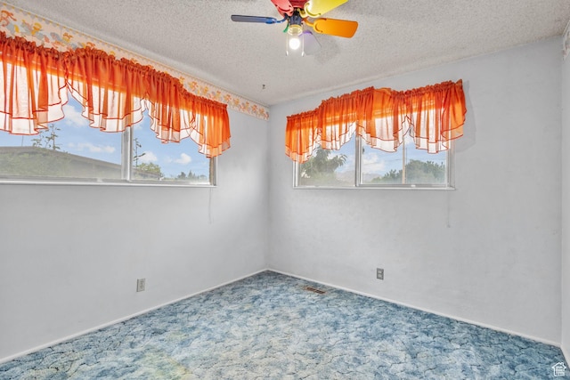 9216 S 2700 W, West Jordan, UT 84088 - unfurnished room with a ceiling fan, carpet, a textured ceiling, and baseboards