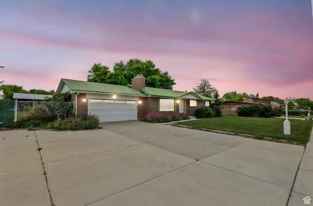9216 S 2700 W, West Jordan, UT 84088 - ranch-style house with a chimney, driveway, an attached garage, and brick siding