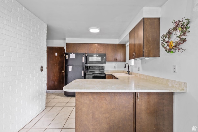 9216 S 2700 W, West Jordan, UT 84088 - kitchen featuring black appliances, a sink, light countertops, a peninsula, and light tile patterned flooring
