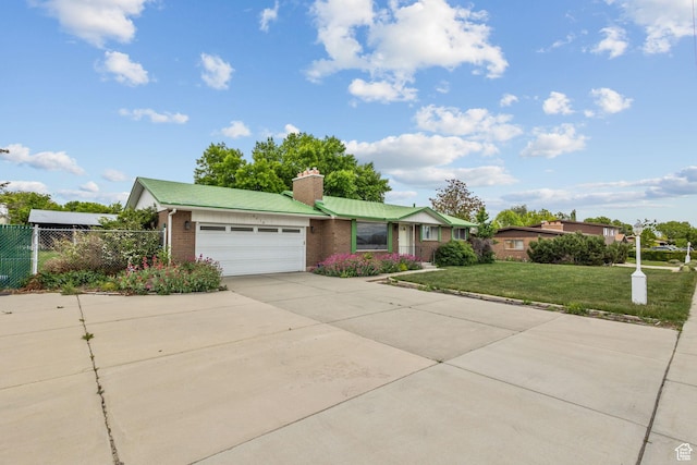 9216 S 2700 W, West Jordan, UT 84088 - ranch-style house featuring brick siding, a garage, driveway, and a chimney
