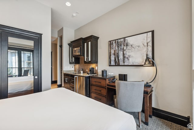 2100 Frostwood Blvd Unit 5130, Snyderville, UT 84098 - bedroom featuring baseboards, bar with sink, and recessed lighting
