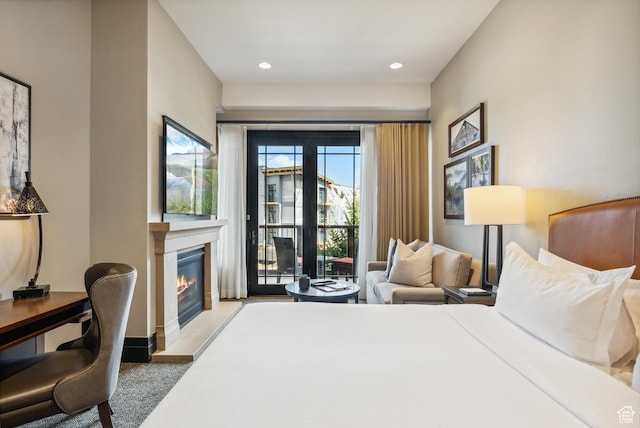2100 Frostwood Blvd Unit 5130, Snyderville, UT 84098 - bedroom featuring a glass covered fireplace and recessed lighting