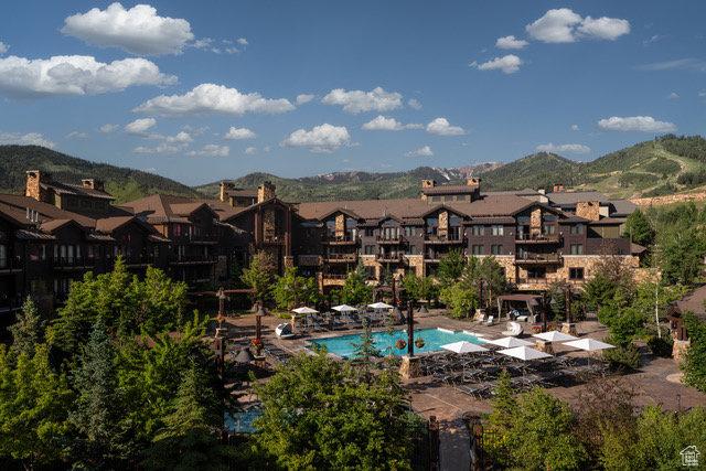 2100 Frostwood Blvd Unit 5130, Snyderville, UT 84098 - community pool featuring a residential view and a mountain view