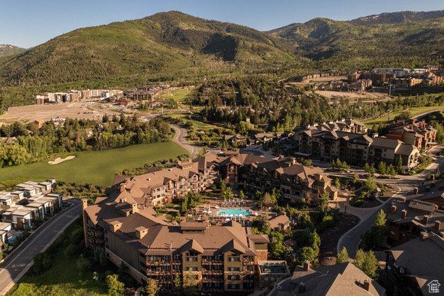 2100 Frostwood Blvd Unit 5130, Snyderville, UT 84098 - aerial view of property and surrounding area with mountains and nearby suburban area
