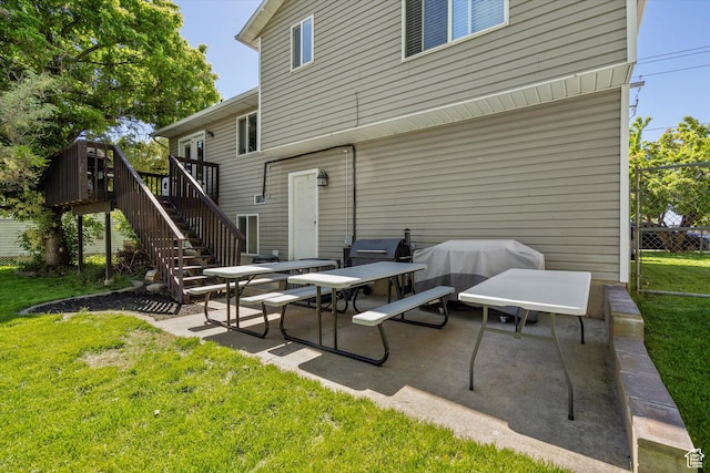 3916 W 4800 S, Roy, UT 84067 - back of house featuring a patio area, stairs, and a wooden deck