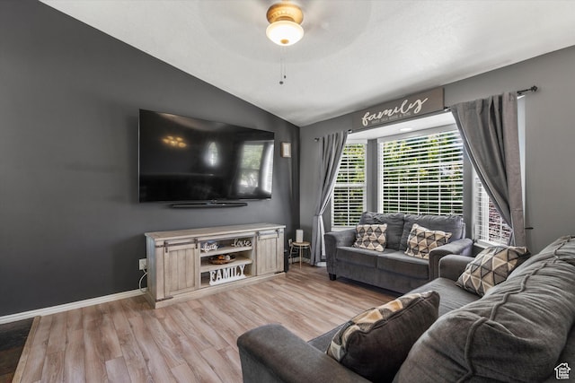 3916 W 4800 S, Roy, UT 84067 - living room with vaulted ceiling, light wood-style flooring, ceiling fan, and baseboards