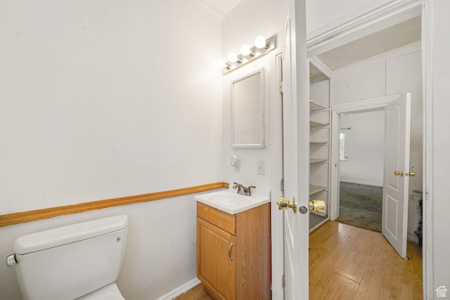 611 E 500 N, Spanish Fork, UT 84660 - bathroom with toilet, vanity, and wood-type flooring