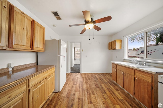 611 E 500 N, Spanish Fork, UT 84660 - kitchen featuring freestanding refrigerator, light wood-type flooring, a sink, a ceiling fan, and baseboards