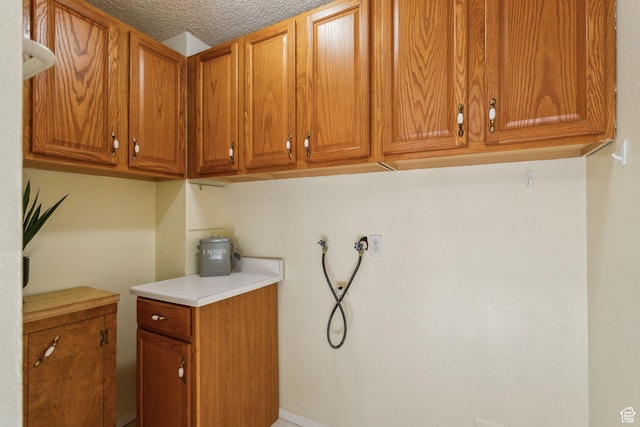295 S 2nd St, Tooele, UT 84074 - washroom featuring cabinet space and hookup for a washing machine