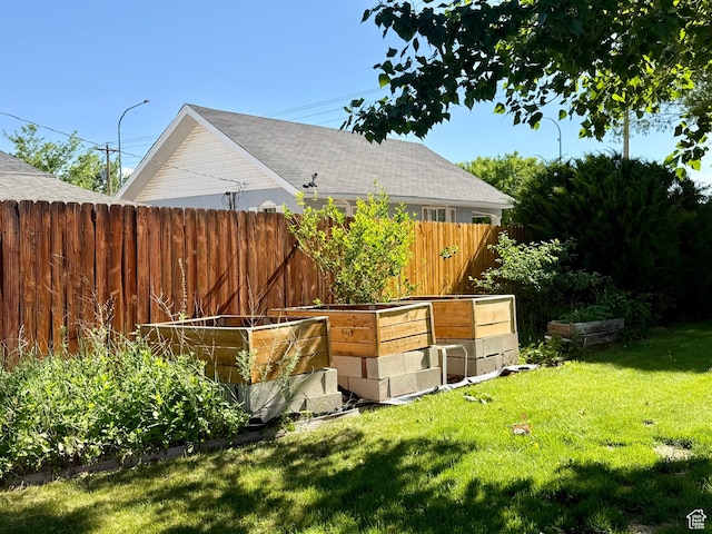 169 N State St, Roosevelt, UT 84066 - view of yard featuring a vegetable garden