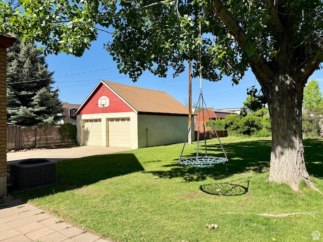 169 N State St, Roosevelt, UT 84066 - view of yard with a garage, cooling unit, and an outbuilding
