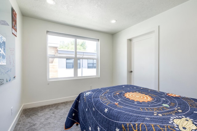 260 W 500 N Unit 4, Salt Lake City, UT 84103 - bedroom featuring carpet, baseboards, a textured ceiling, and recessed lighting