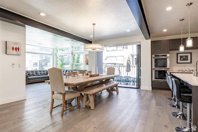 260 W 500 N Unit 4, Salt Lake City, UT 84103 - dining space with baseboards, wood finished floors, and recessed lighting