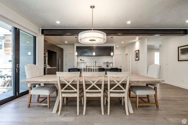 260 W 500 N Unit 4, Salt Lake City, UT 84103 - dining space with light wood finished floors, baseboards, and recessed lighting