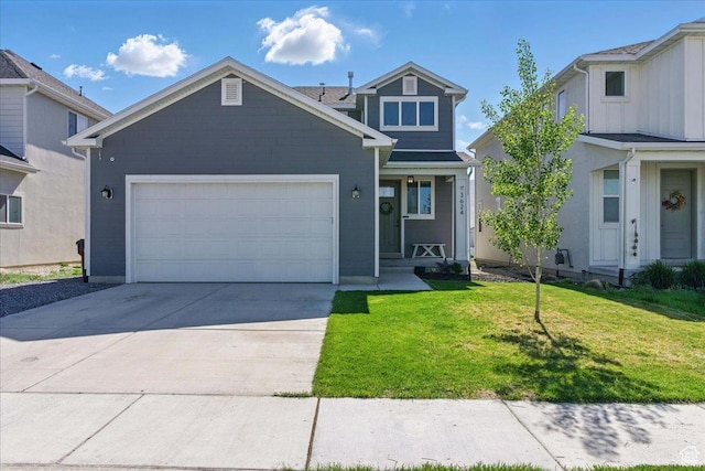 3624 N Annabell St, Eagle Mountain, UT 84005 - view of front of property with a garage, a front lawn, and concrete driveway