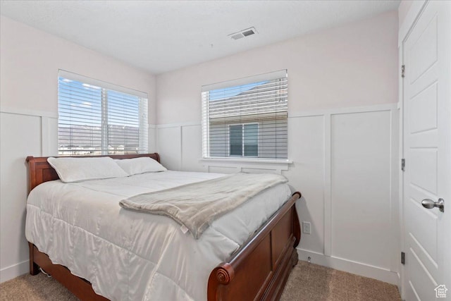 3624 N Annabell St, Eagle Mountain, UT 84005 - carpeted bedroom with a decorative wall and a wainscoted wall