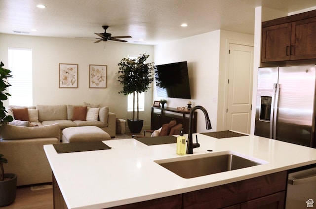 1376 Rustico, Washington, UT 84780 - kitchen featuring a sink, stainless steel appliances, open floor plan, light countertops, and a ceiling fan