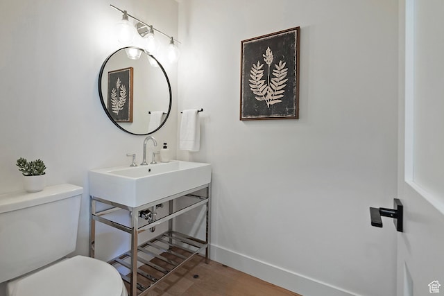 1504 Lake Front Ct, Park City, UT 84098 - bathroom with toilet, wood finished floors, baseboards, and a sink
