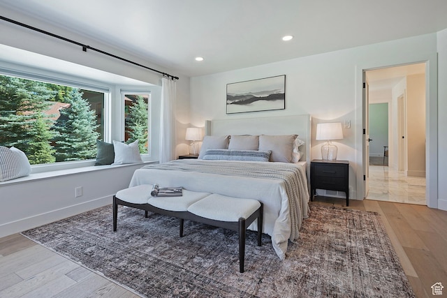1504 Lake Front Ct, Park City, UT 84098 - bedroom featuring wood finished floors, recessed lighting, and baseboards
