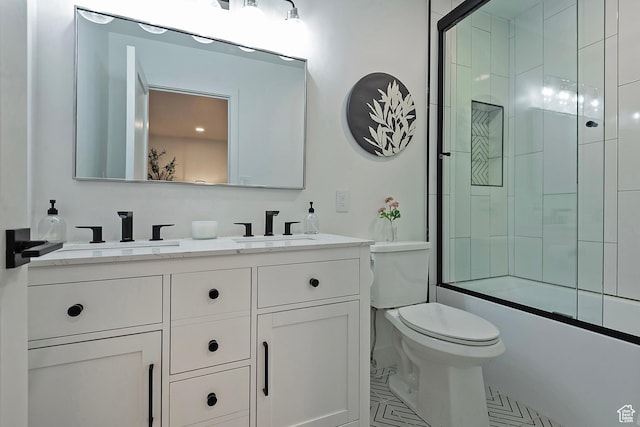 1504 Lake Front Ct, Park City, UT 84098 - bathroom featuring double vanity, toilet, enclosed tub / shower combo, and tile patterned flooring