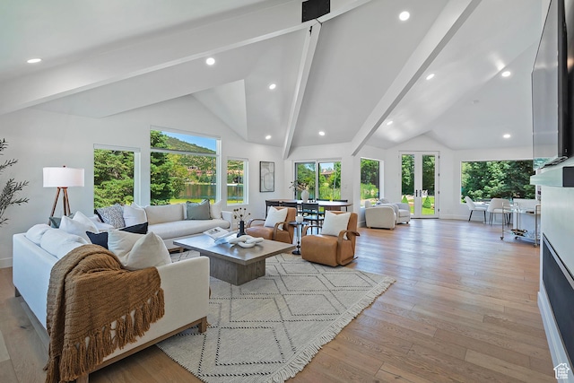 1504 Lake Front Ct, Park City, UT 84098 - living area featuring beam ceiling, light wood finished floors, recessed lighting, high vaulted ceiling, and french doors
