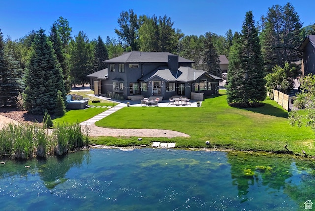 1504 Lake Front Ct, Park City, UT 84098 - rear view of house featuring a patio, a yard, and a water view
