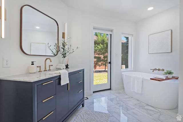1504 Lake Front Ct, Park City, UT 84098 - full bath featuring vanity, a freestanding bath, recessed lighting, marble finish flooring, and baseboards