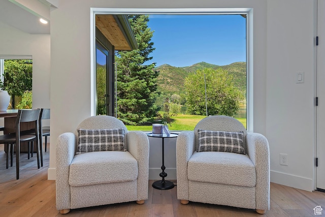 1504 Lake Front Ct, Park City, UT 84098 - sitting room with light wood-style flooring, baseboards, and a mountain view