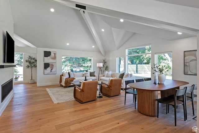 1504 Lake Front Ct, Park City, UT 84098 - living room with beamed ceiling, light wood-type flooring, a fireplace, recessed lighting, and baseboards