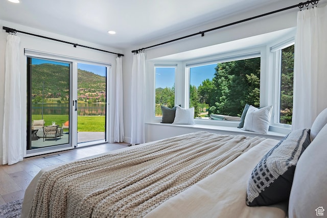 1504 Lake Front Ct, Park City, UT 84098 - bedroom with access to outside, multiple windows, wood finished floors, and recessed lighting