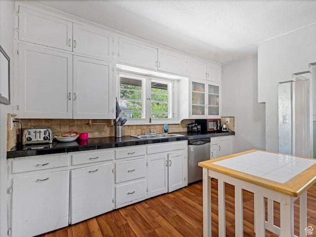 628 E 420 N, Provo, UT 84606 - kitchen featuring dishwasher, a sink, white cabinets, and tasteful backsplash