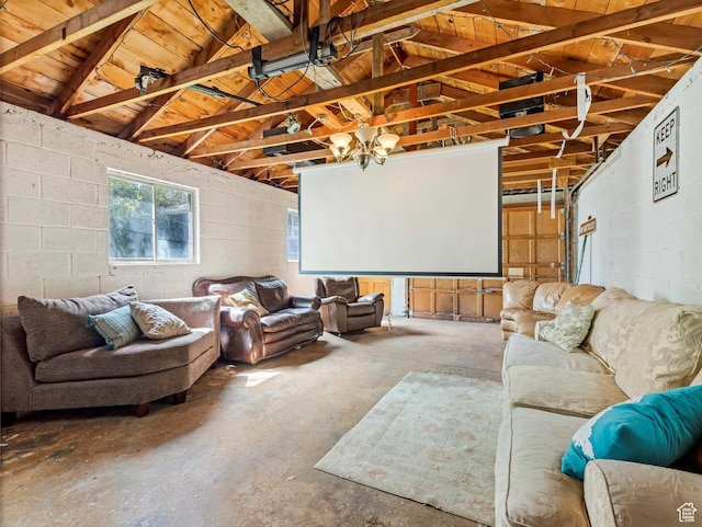 628 E 420 N, Provo, UT 84606 - home theater room with vaulted ceiling, concrete block wall, concrete floors, and wood ceiling
