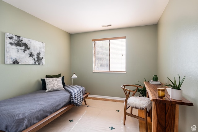 2660 E 3300 S Unit A-21, Salt Lake City, UT 84109 - bedroom with wood finished floors and baseboards