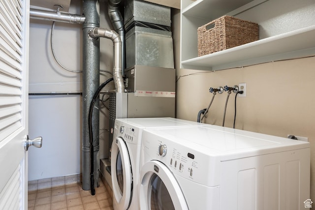 2660 E 3300 S Unit A-21, Salt Lake City, UT 84109 - laundry room featuring separate washer and dryer