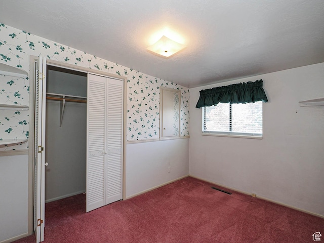 5747 S Sanford Dr, Murray, UT 84123 - unfurnished bedroom with carpet, a closet, wallpapered walls, and baseboards
