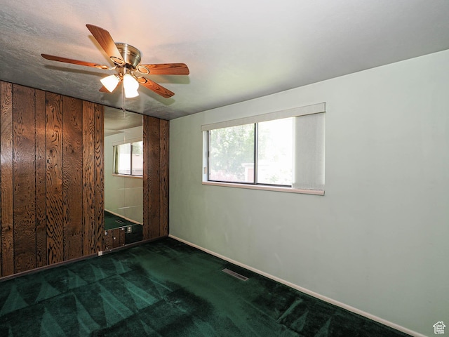 5747 S Sanford Dr, Murray, UT 84123 - unfurnished room featuring carpet floors, baseboards, and ceiling fan