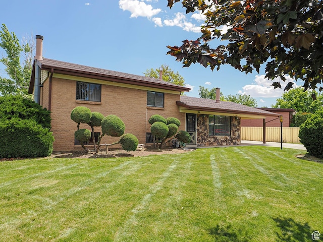 5747 S Sanford Dr, Murray, UT 84123 - rear view of house with a chimney and a patio