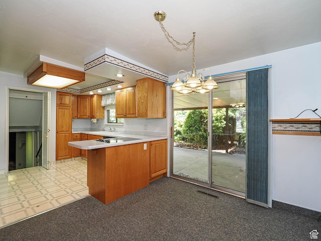 5747 S Sanford Dr, Murray, UT 84123 - kitchen featuring a chandelier, a peninsula, light countertops, a sink, and healthy amount of natural light