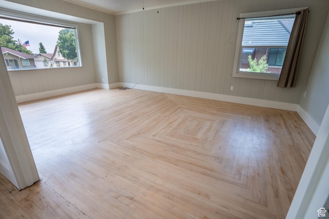 354 N 200 E, Logan, UT 84321 - empty room featuring healthy amount of natural light, baseboards, and crown molding