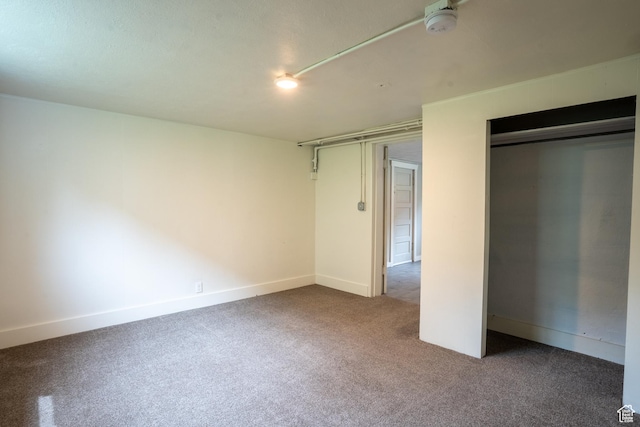 354 N 200 E, Logan, UT 84321 - unfurnished bedroom with carpet flooring, a closet, and baseboards