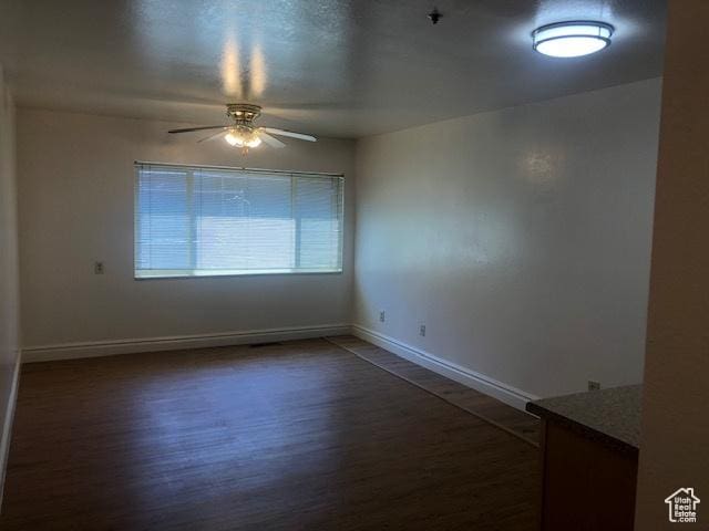 361 N 300 W Unit 107, Provo, UT 84601 - unfurnished room featuring ceiling fan, wood finished floors, baseboards, and a pendent fire sprinkler