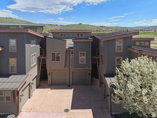 6322 N Park Ln Unit 3, Park City, UT 84098 - contemporary home featuring an attached garage, a mountain view, and driveway